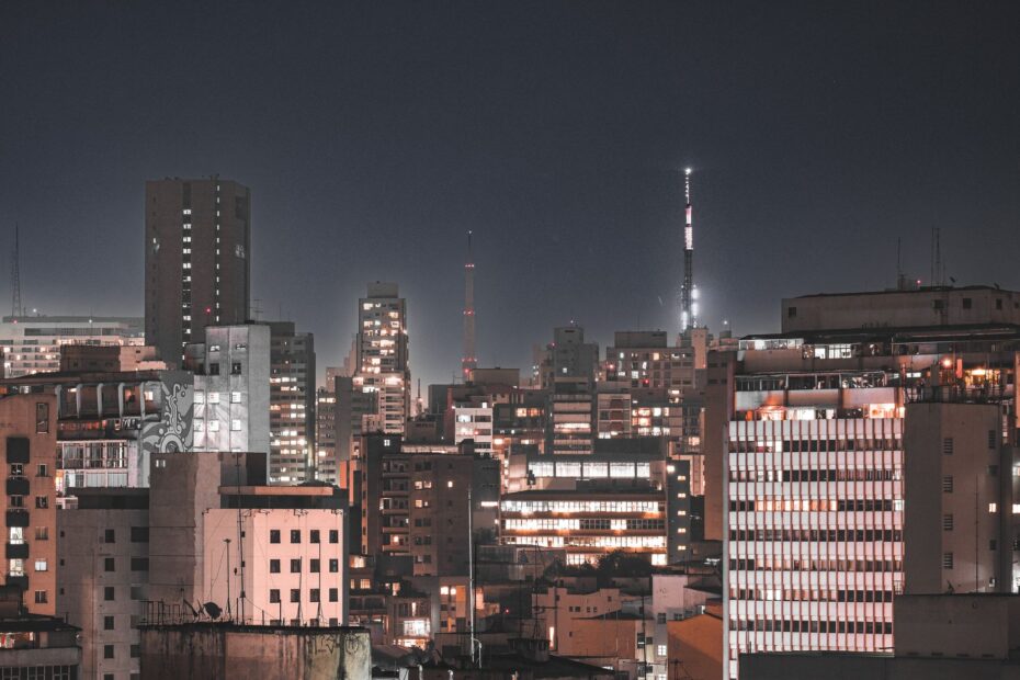 Stunning nighttime skyline of São Paulo, showcasing illuminated modern architecture and urban landscape.