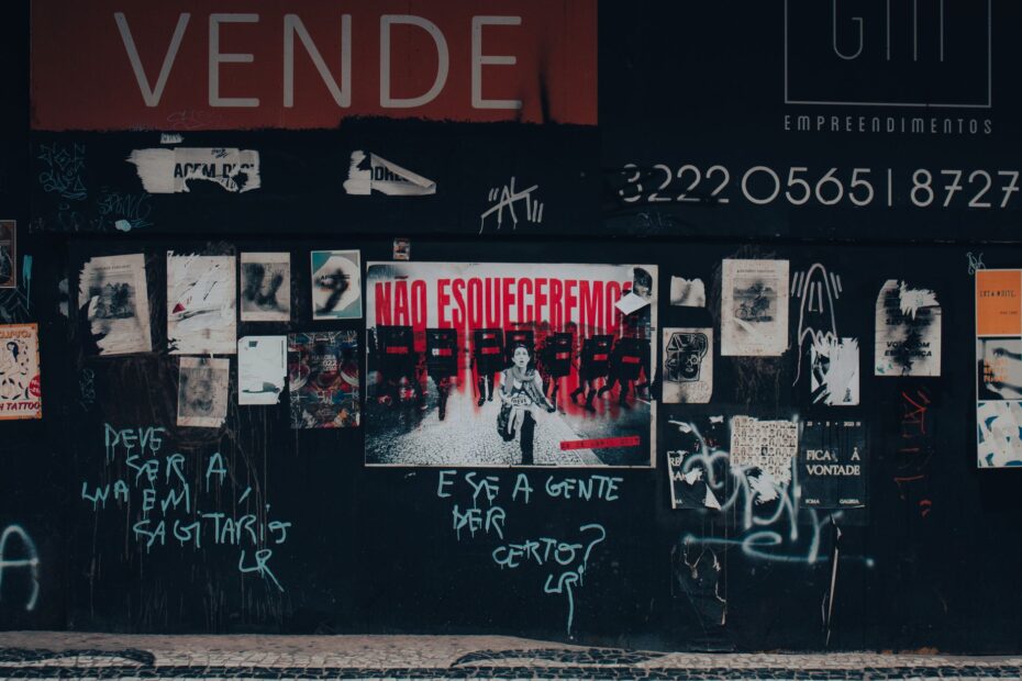 Creative urban street scene with graffiti and posters in Curitiba, Brazil.
