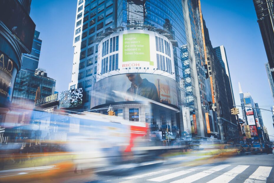 Dynamic capture of Times Square showcasing bustling city life and traffic in New York City.