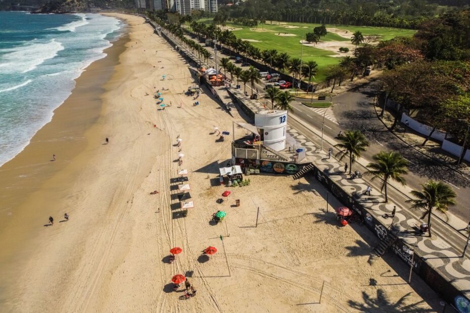 A stunning aerial shot of a beach in Rio de Janeiro with vibrant cityscape and coastline.